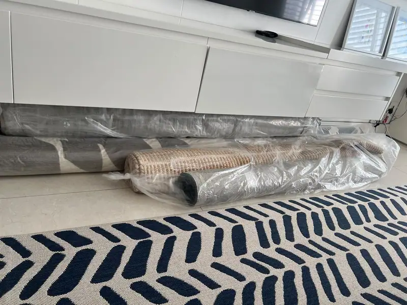 Wrapped rugs delivered to a customer's home